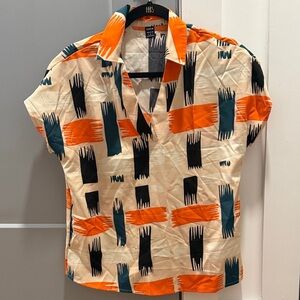 SHEIN Woman’s Shirt with Orange, Black, and Cream Pattern